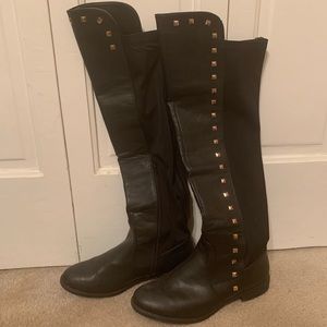 Tall knee high black boots